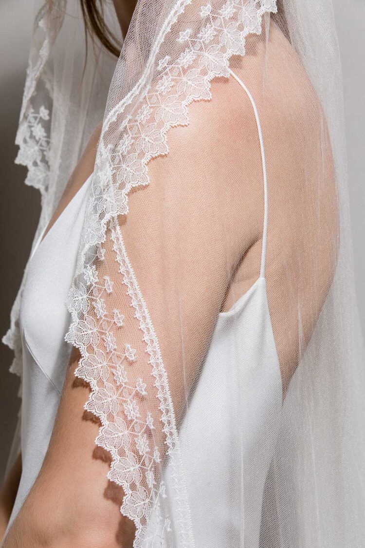 detail of our astrid vintage lace veil with 1930s inspired leavers lace trim