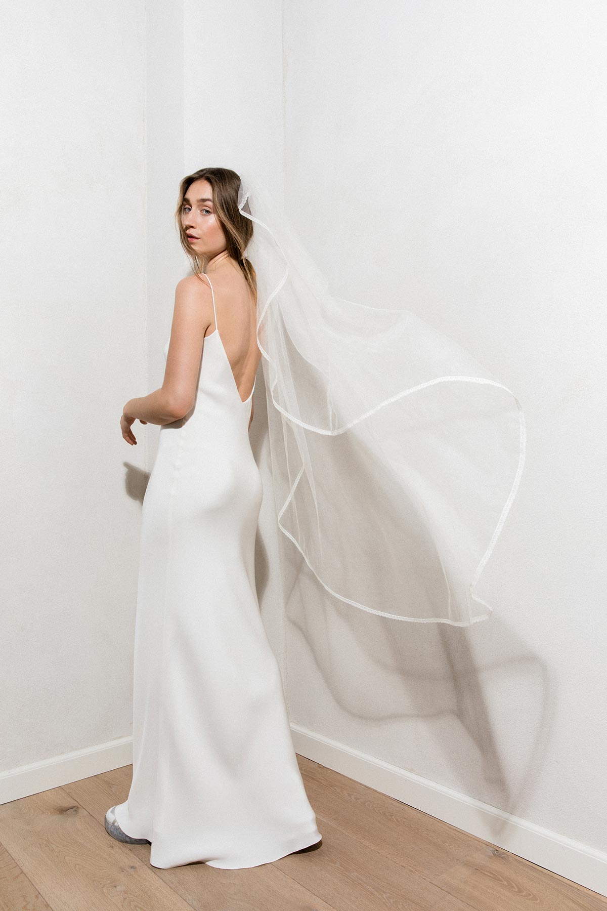 midi length modern bridal veil look with slip dress
