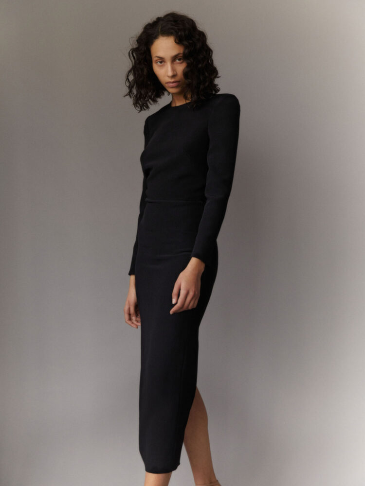black bodycon midi dress with long sleeves and slit in heavy crepe - wedding and occasion wear