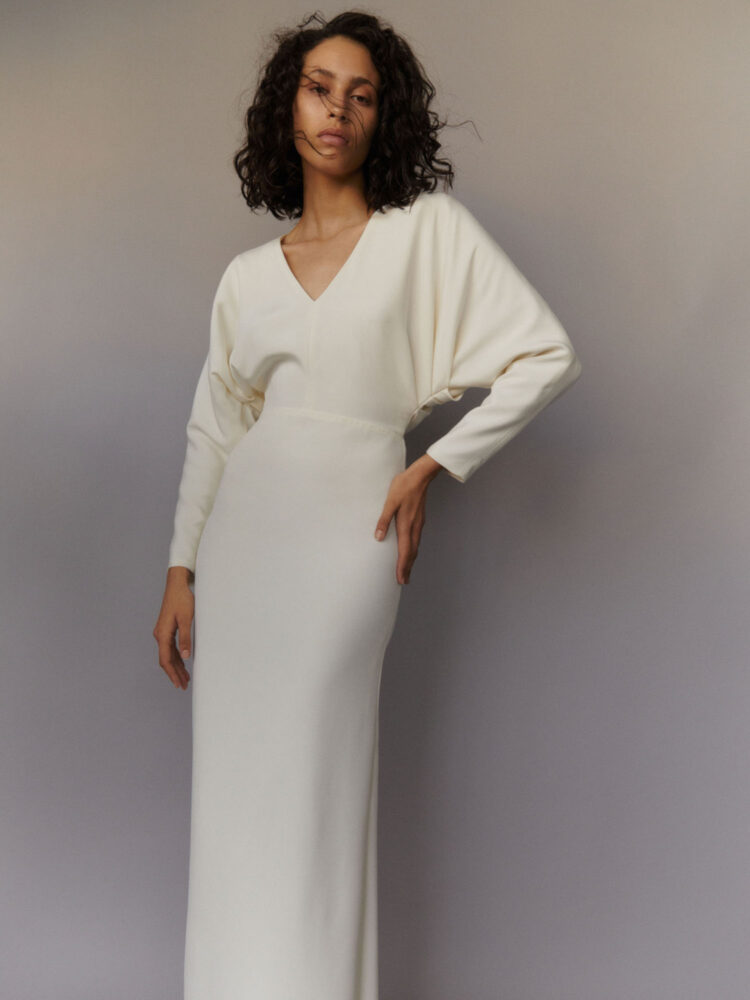 simple long sleeve wedding dress with drape sleeve details in buttery soft silk crepe