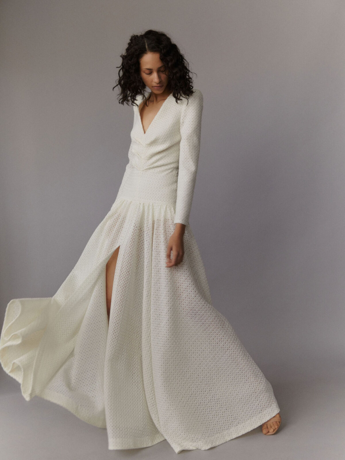 ivory full skirt gown with long sleeves in embroidered velvet