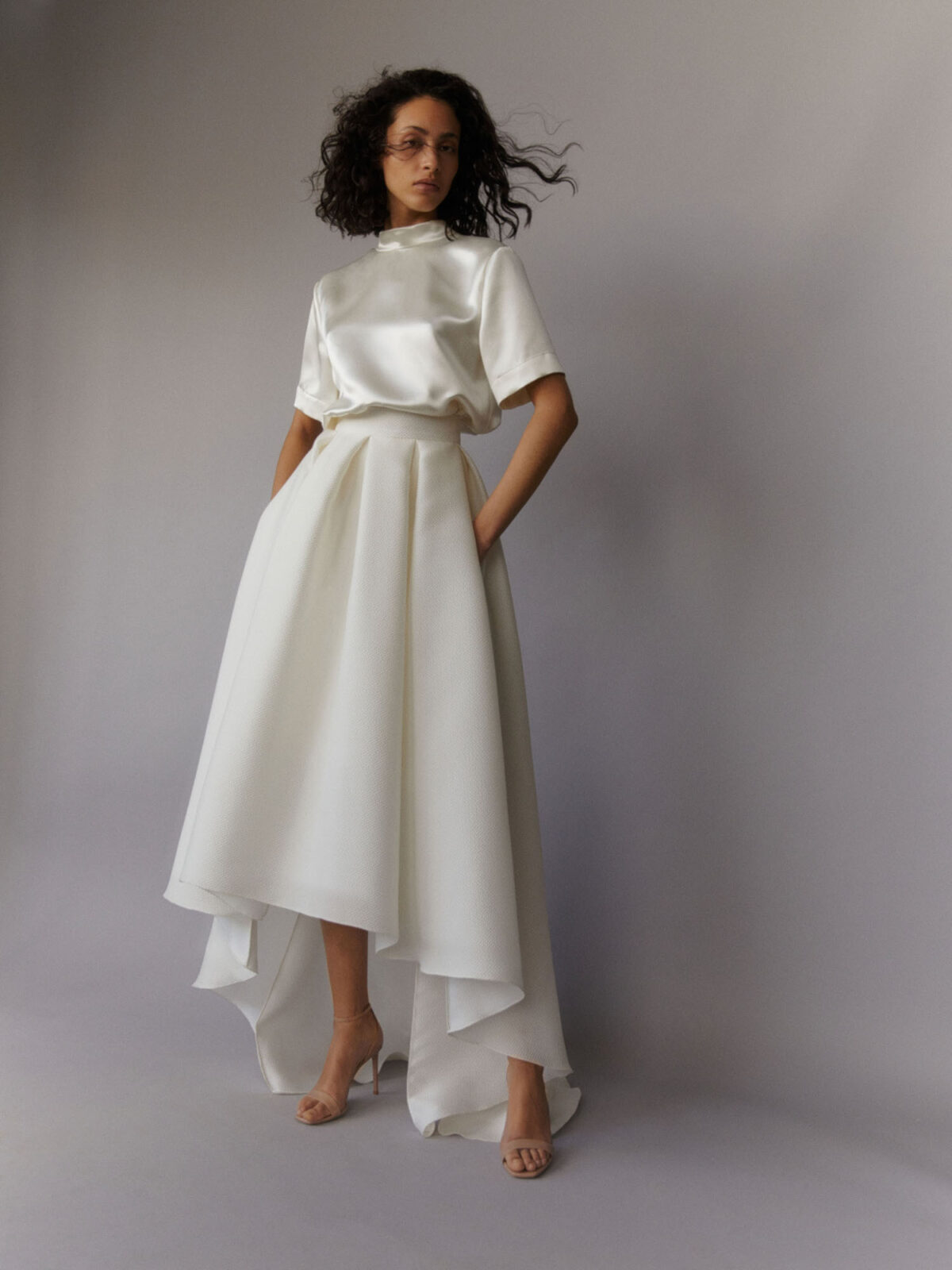 high-low wedding dress outfit; high collar top in ivory silk satin and high-low skirt in jacquard gazar