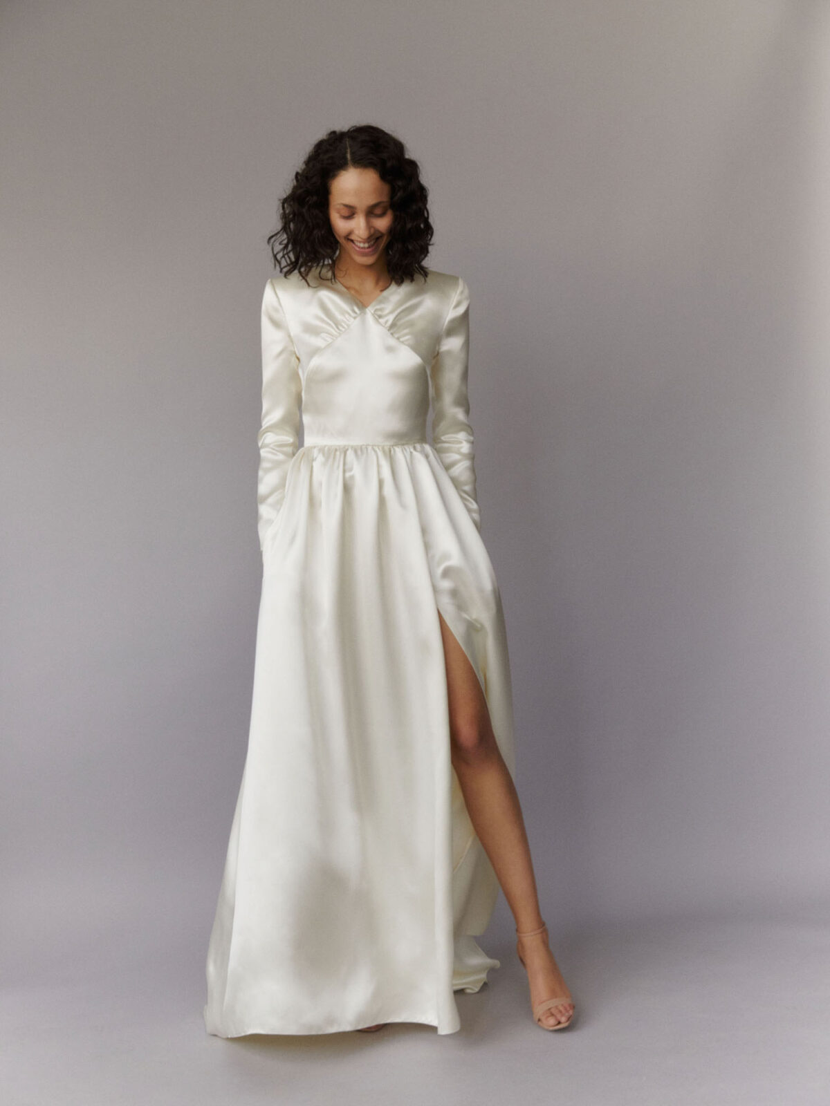 long sleeve satin wedding dress with slit