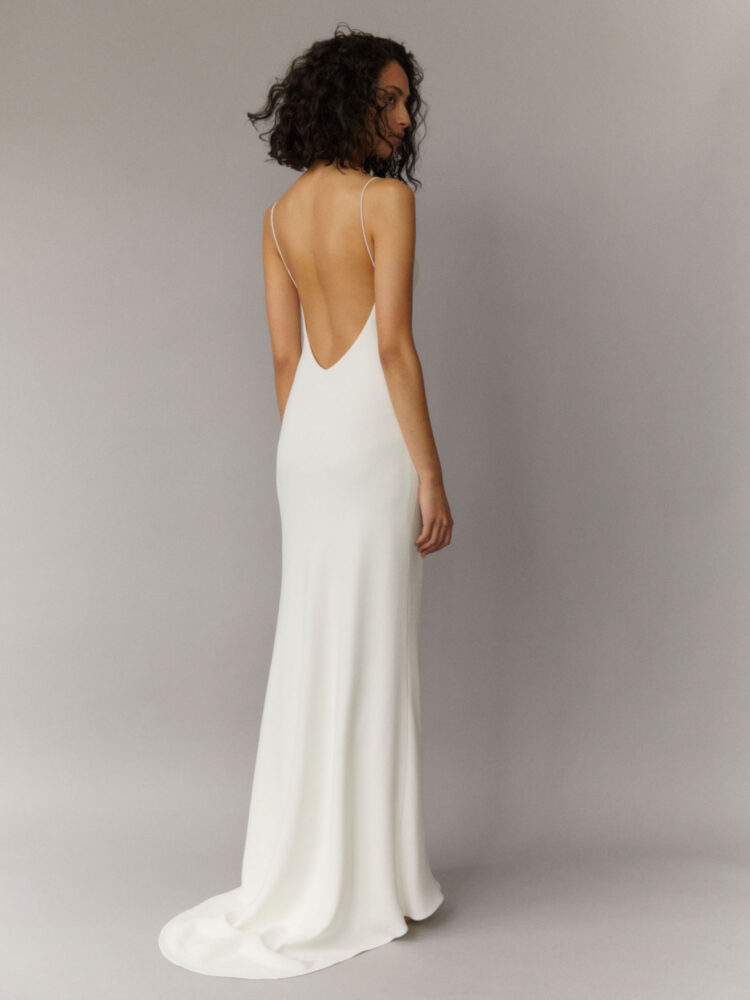 bias-cut bridal slip dress with spaghetti straps and plunging back in ivory heavy crepe
